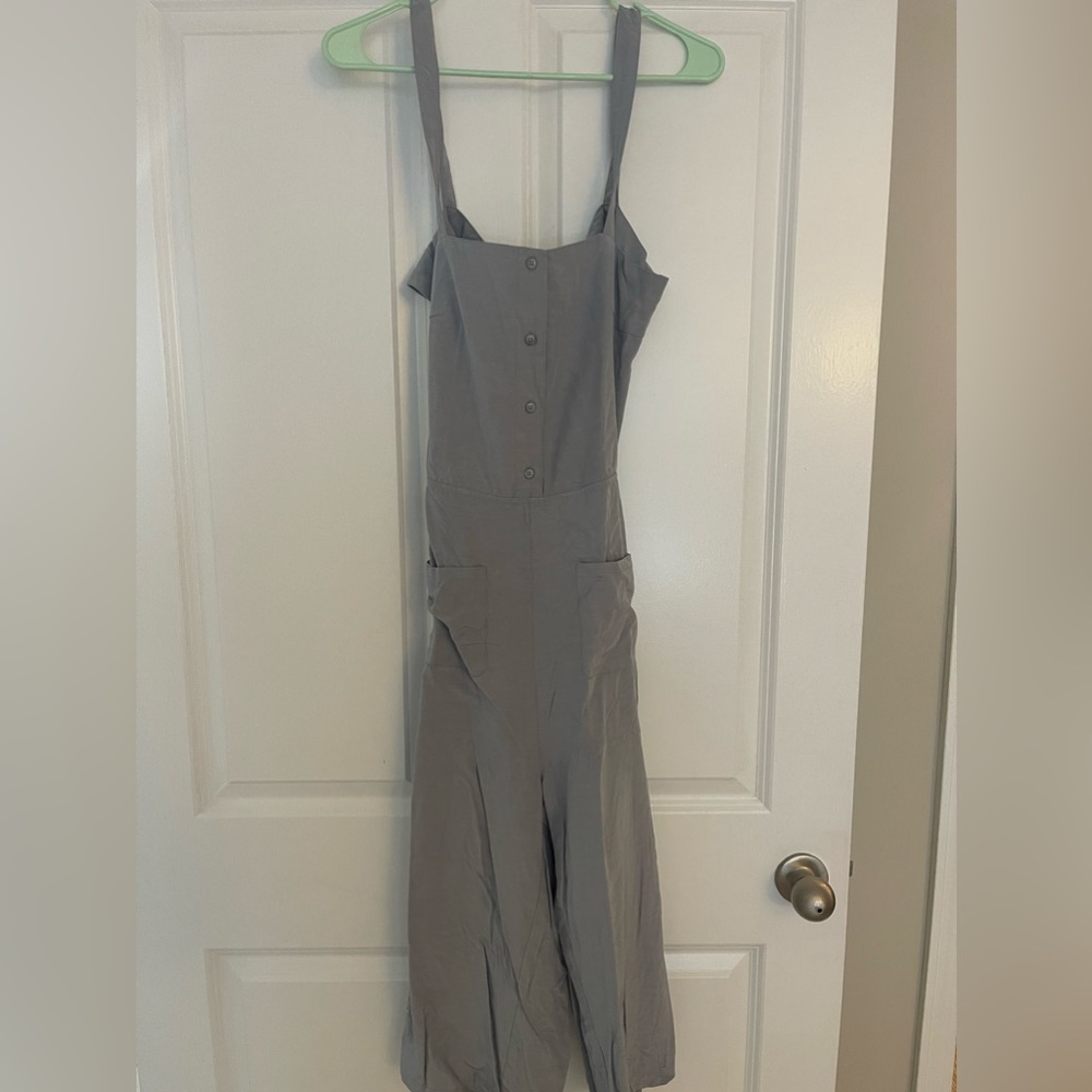 Tags on Grey Kittenish jumpsuit! Brand new, never worn. Open back with tie
